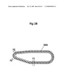 Hybrid Combination of Rubber Track with Road Wheels for a Vehicle diagram and image