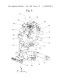 DEVICE AND METHOD FOR ACCEPTING A CUT LENGTH OF WIRE THAT HAS BEEN FORMED INTO A COIL diagram and image