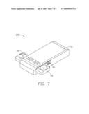 Portable electronic device with movable speaker device diagram and image