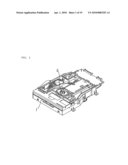 Storage medium carrying mechanism in storage medium reproducing apparatus or storage medium recording/reproducing apparatus diagram and image