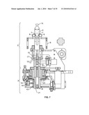 STRETCH FILM SLEEVE LABEL APPLICATOR diagram and image