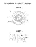 CHUCKING DEVICE, BRUSHLESS MOTOR, DISK DRIVE APPARATUS AND METHOD FOR MANUFACTURING THE CHUCKING DEVICE diagram and image