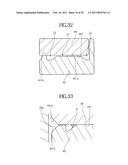 CHUCKING DEVICE, BRUSHLESS MOTOR, DISK DRIVE APPARATUS AND METHOD FOR MANUFACTURING THE CHUCKING DEVICE diagram and image