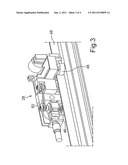 Method and Device for Carrying out a Work Operation on a Moving Workpiece diagram and image