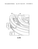 Dry Powder Inhalers with Rotating Piercing Mechanisms and Related Devices     and Methods diagram and image