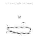 Hybrid Combination of Rubber Track with Road Wheels for a Vehicle diagram and image