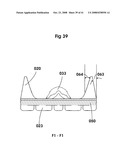 Hybrid Combination of Rubber Track with Road Wheels for a Vehicle diagram and image