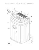 SHREDDER ADAPTED TO ENCOURAGE THE SETTLING OF SHREDDED MATERIAL THEREIN AND A METHOD OF SHREDDING diagram and image