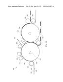 Process and Apparatus for Manufacturing an Absorbent Article Using a Laser     Source diagram and image