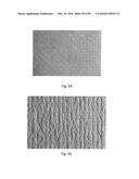 ABSORBENT ARTICLES COMPRISING GARMENT-FACING LAMINATES diagram and image