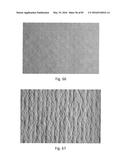 ABSORBENT ARTICLES COMPRISING GARMENT-FACING LAMINATES diagram and image